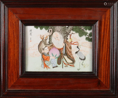 Chinese porcelain plaque in wooden frame. With an image