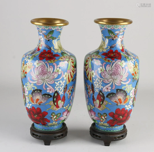 Two old Chinese cloisonnÃ© vases on console.