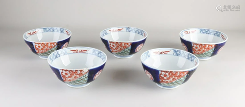 Five antique Japanese Imari porcelain bowls.