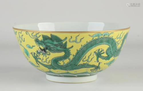 Chinese porcelain dragon bowl with yellow glaze and