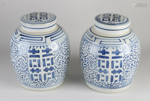 Two large Chinese porcelain lidded pots with floral