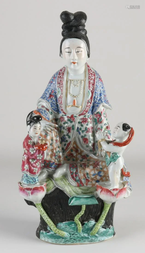 Chinese porcelain Quan Yin with children. With Family