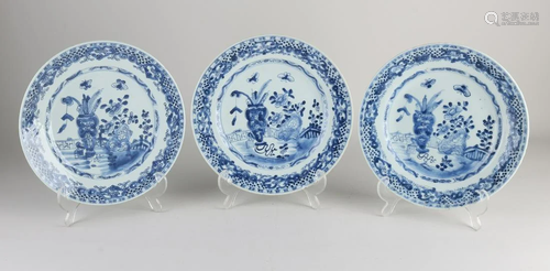 Three Chinese porcelain plates with garden/butterfly