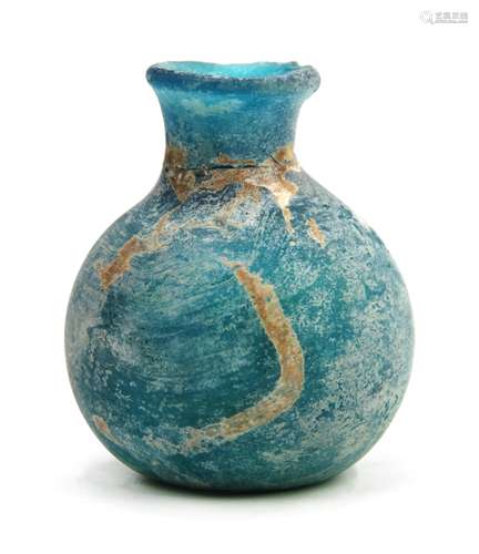 A SMALL RELICS BOTTLE OF BLUEGLASSL