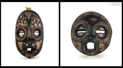 TWO CARVED WOOD AFRICAN MASKS