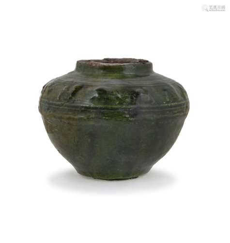 A GREEN GLAZED CHINESE JAR WITH RAISED PATTERNS
