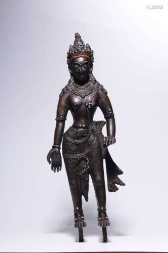 In the 17th century, a statue of Avalokitesvara inlaid in br...