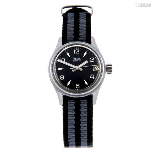 SMITHS - a wrist watch.