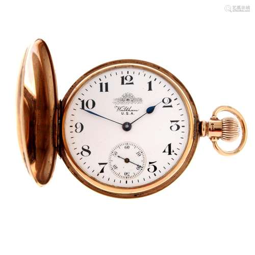 A full hunter pocket watch by Waltham.