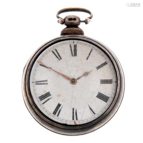 An open face pocket watch.