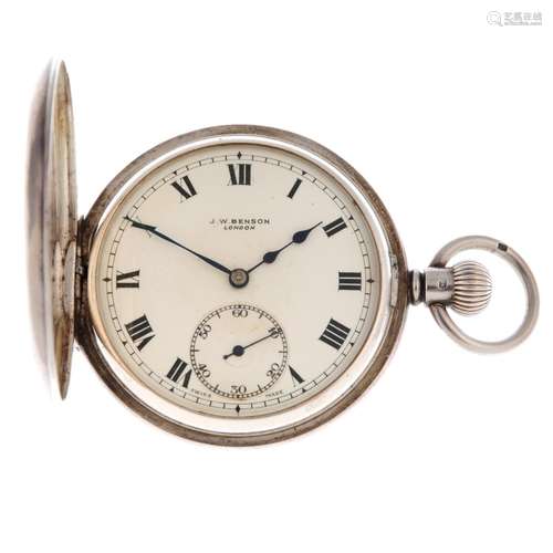 A half hunter pocket watch by J.W Benson.