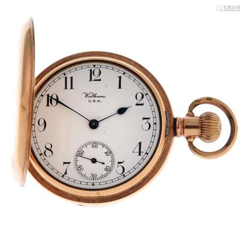 A full hunter pocket watch by Waltham.