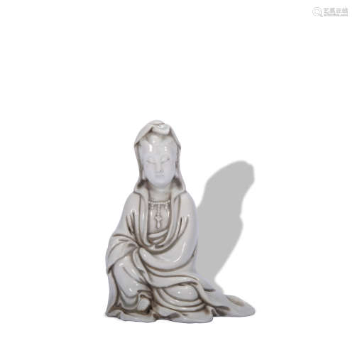 A white glazed statue of Guanyin