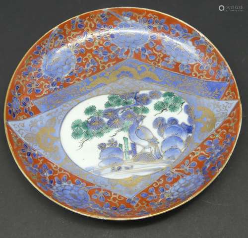 Assiette en porcelaine polychrome d'Imari à décor de volatil...