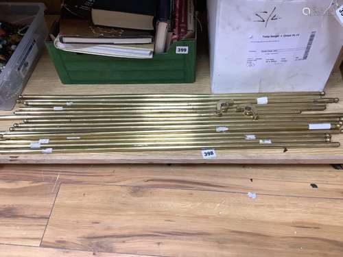 Fifteen Victorian brass stair rods with brackets