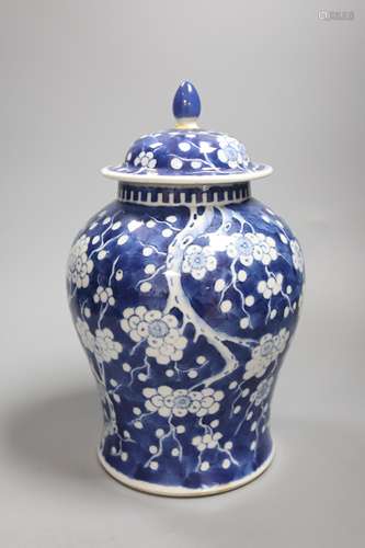 A 20th century Chinese blue and white jar and cover with pru...