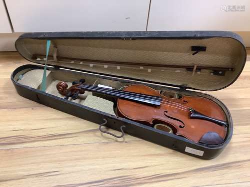 A violin and bow, in case, label to interior read Antonius S...