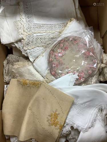 A box of assorted textiles to include a Chinese woven carpet