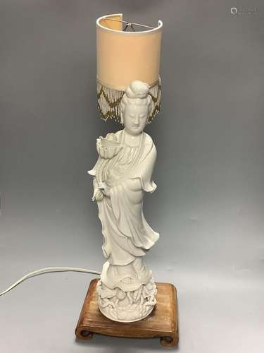 A blanc de chine geisha modelled as a lamp, height overall 5...