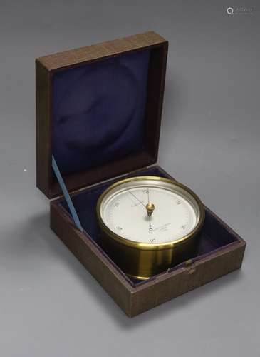 A cased Negretti & Zambra brass cased barometer, diameter 12...