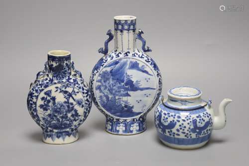 Two 19th century Chinese blue and white moon flasks and a te...