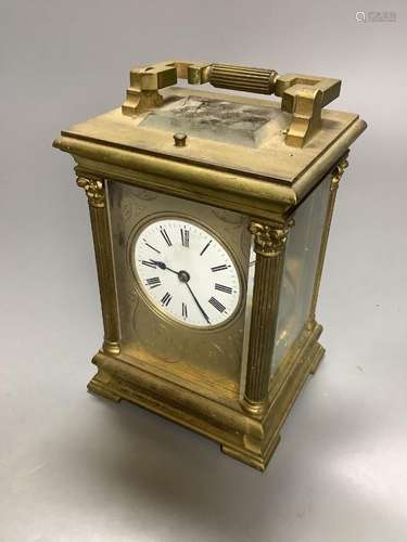 A large French gilt brass repeating carriage clock, signed E...