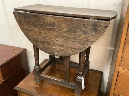 An early oak gateleg occasional table, width 60cm, depth 29c...