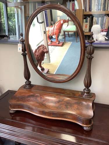 A Victorian mahogany toilet mirror, with hinged box base, wi...