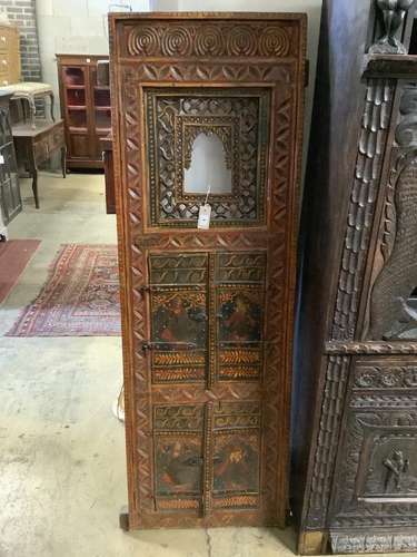 An Indian carved gilt painted panel, width 60cm height 170cm