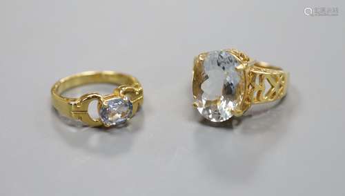 A pale aquamarine ring, pierced 18ct gold setting and shank ...