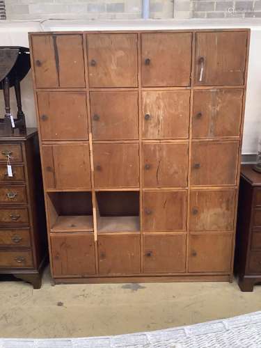 A mid 20th century locker cabinet (one door missing), width ...