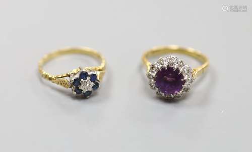 An 18ct yellow gold, diamond and amethyst cluster ring and a...