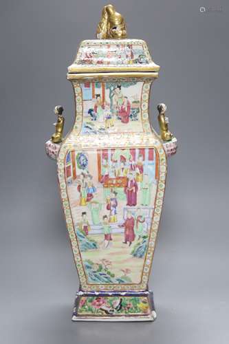 A large Chinese famille rose Canton decorated vase and cover...