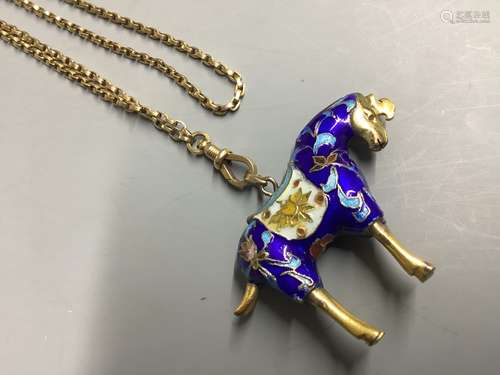 An enamelled gilt horse pendant on an unmarked yellow metal ...