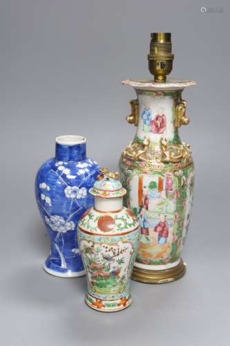 A Chinese famille rose converted lamp, a similar blue and wh...