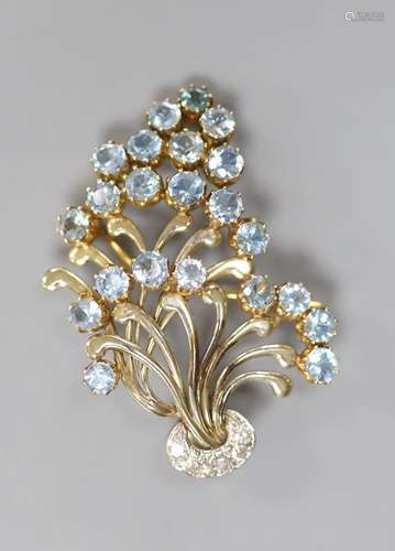 A 1950's yellow and white metal, aquamarine and diamond clus...