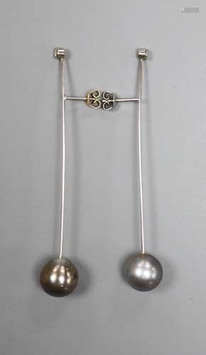 A pair of white metal, cultured Tahitian pearl and diamond s...