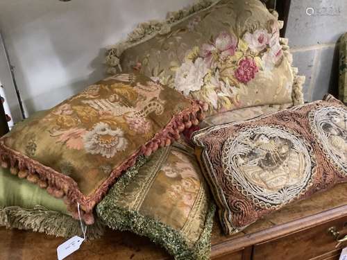 Seven embroidered cushions, largest 54 x 43cm