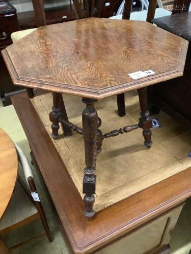 An Edwardian octagonal oak occasional table, width 60cm dept...