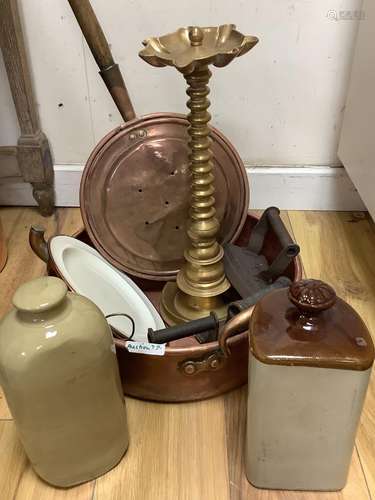 A group of mixed copper, brass and stoneware