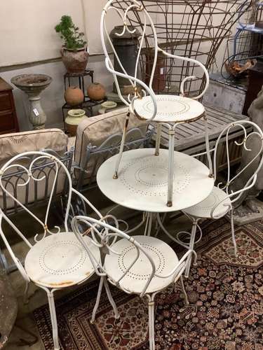 A wrought iron circular garden table, 70cm diameter, height ...