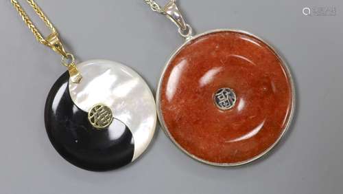 A Chinese gold-mounted black and mother of pearl Yin Yang pe...