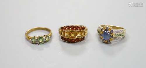 A 9ct gold cabochon sapphire and diamond ring and two other ...