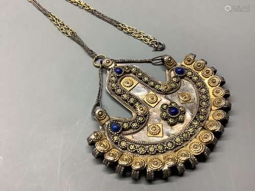 An Afghan? parcel gilt white metal and cabochon lapis lazuli...