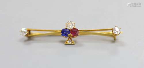 An Edwardian yellow metal, ruby, sapphire and diamond set cl...