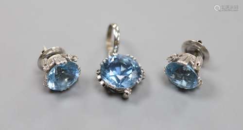 A modern pair of white metal, aquamarine and diamond set ear...