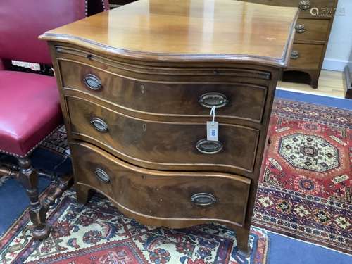 Two George III design mahogany serpentine chests, each fitte...