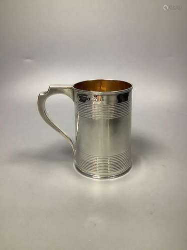 A George III silver mug, with reeded bands, marks rubbed, ci...