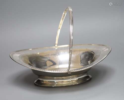 A George III pierced silver oval cake basket, maker's mark r...