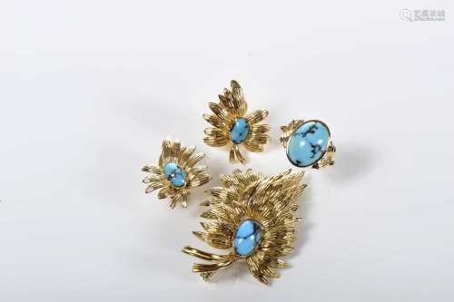 A set of brooch, pair of earrings and ring